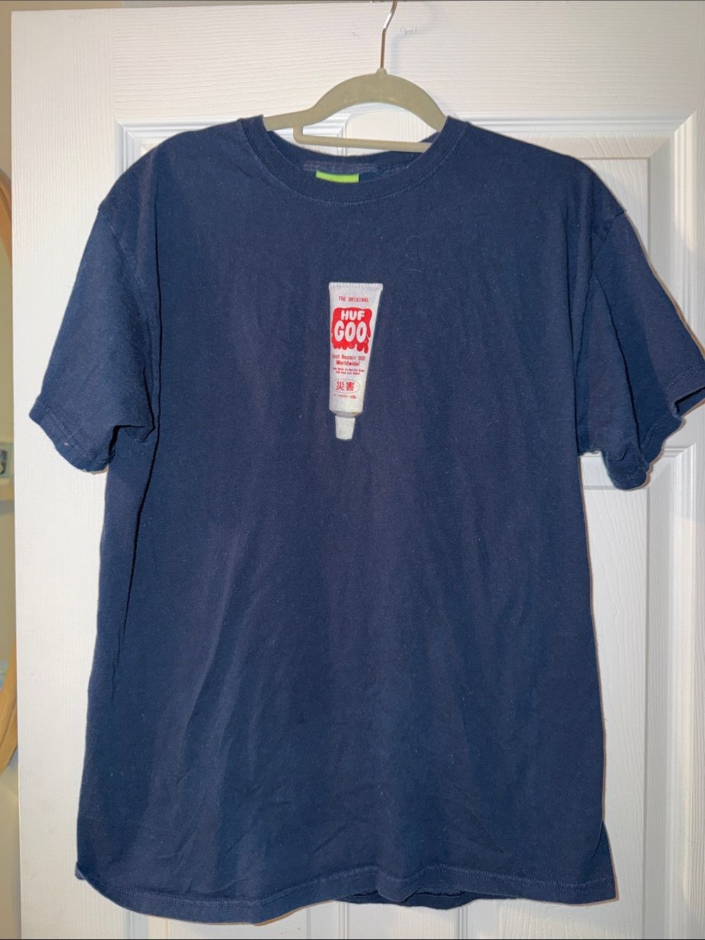 HUF Navy Blue T-Shirt with Red & White Tube Graphic
